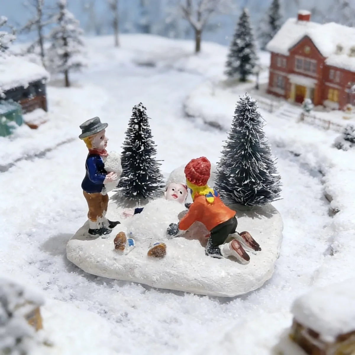 Kids Playing in the Snow — Christmas Village Figurine