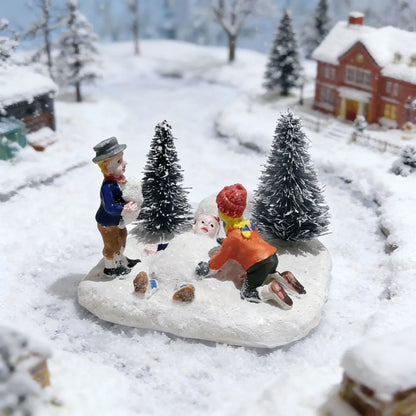 Kids Playing in the Snow — Christmas Village Figurine